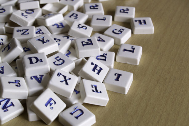 Scrabble pieces over wood background.